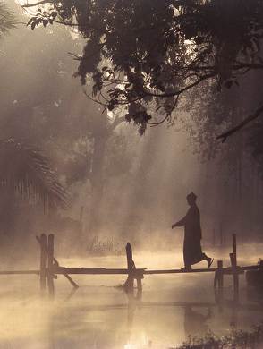 Monk on bridge